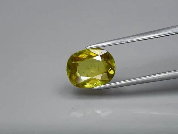 2.19ct 9x7mm Oval Natural Yellowish Green Sphene Madagascar, Amazing Luster